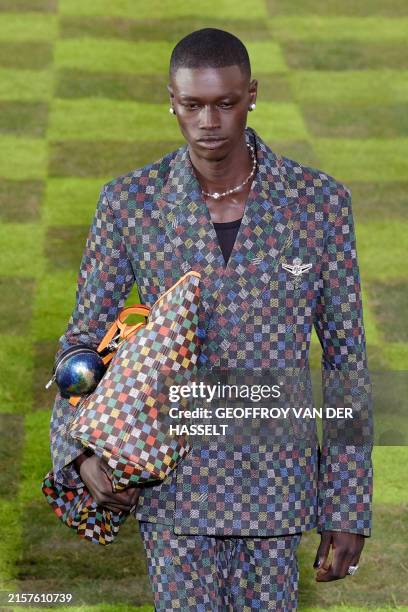 Model presents a creation by Louis Vuitton for the Mens Ready-to-wear Spring/Summer 2025 collection as part of Paris Fashion Week, in Paris on June...