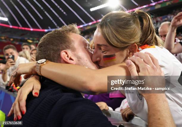 Julian Nagelsmann Head coach of Germany kisses his girlfriend Lena Wurzenberger after the UEFA EURO 2024 group stage match between Germany and...
