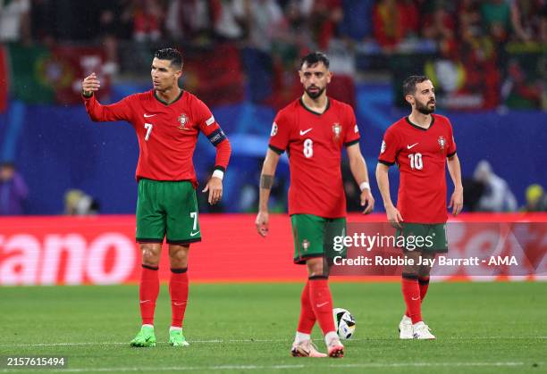 Cristiano Ronaldo Bruno Fernandes and Bernardo Silva of Portugal react after Czech Republic score a goal to make it 1-0 during the UEFA EURO 2024...