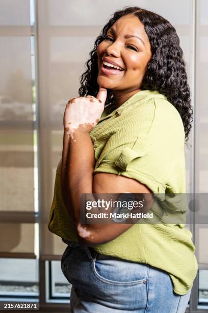 portrait of african american woman - continuous glucose monitor stock pictures, royalty-free photos & images