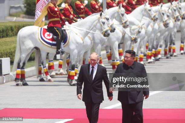 Russian President Vladimir Putin and North Korean Supreme Leader Kim Jong Un attend a welcoming ceremony on June 19, 2024 in Pyongyang, North Korea....