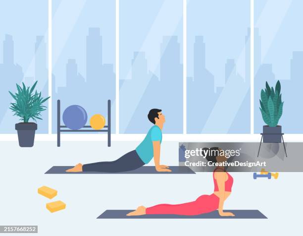 young couple practicing yoga at studio. sports and stretching exercise - couple workout gym stock illustrations