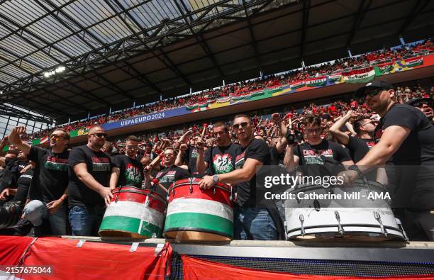 Hungary Carpathian Brigade '09 fans with drums prior to the UEFA EURO 2024 group stage match between Hungary and Switzerland at Cologne Stadium on...