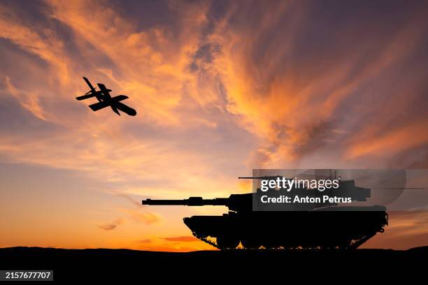 armored tank and and kamikaze drone - remote controlled stock pictures, royalty-free photos & images