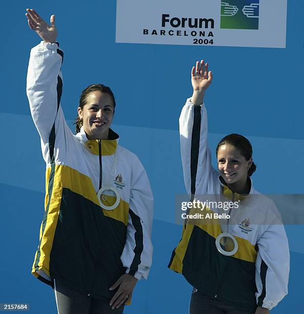 Lynda Dackiw and Loudy Tourky of Australia celebrates after the Women's 10m Synchronised diving final during the 10th World Swimming Championships...