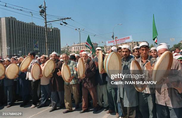 Chechen men play traditionnal music during the celebrations of the third anniversary of Chechen independance in Grozny 06 September 1994. Chechen...