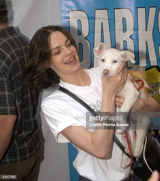 Gypys's Tammy Blanchard poses with a puppy at the 5th Annual Broadway Barks July 12, 2003 at Shubert Alley in New York City. Broadway Barks assists...