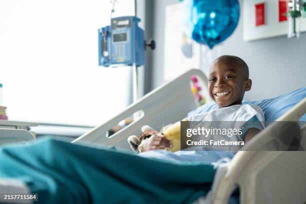 walking through chemo - childhood cancer stock pictures, royalty-free photos & images