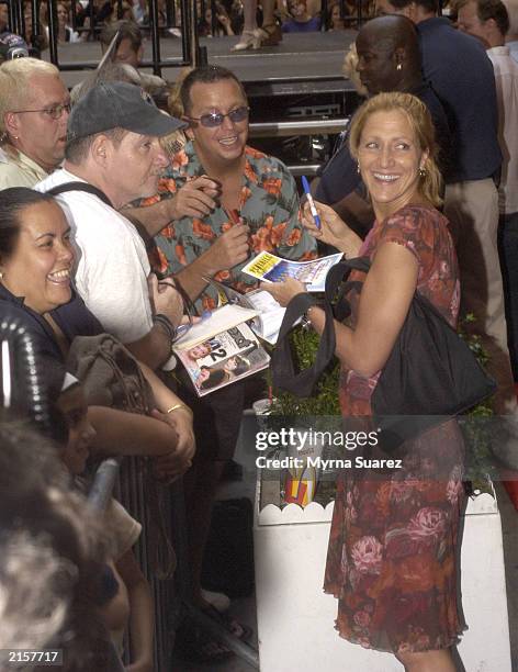 Edie Falco signs autographs for some fans prior to the 5th Annual Broadway Barks July 12, 2003 at Shubert Alley in New York City. Broadway Barks...