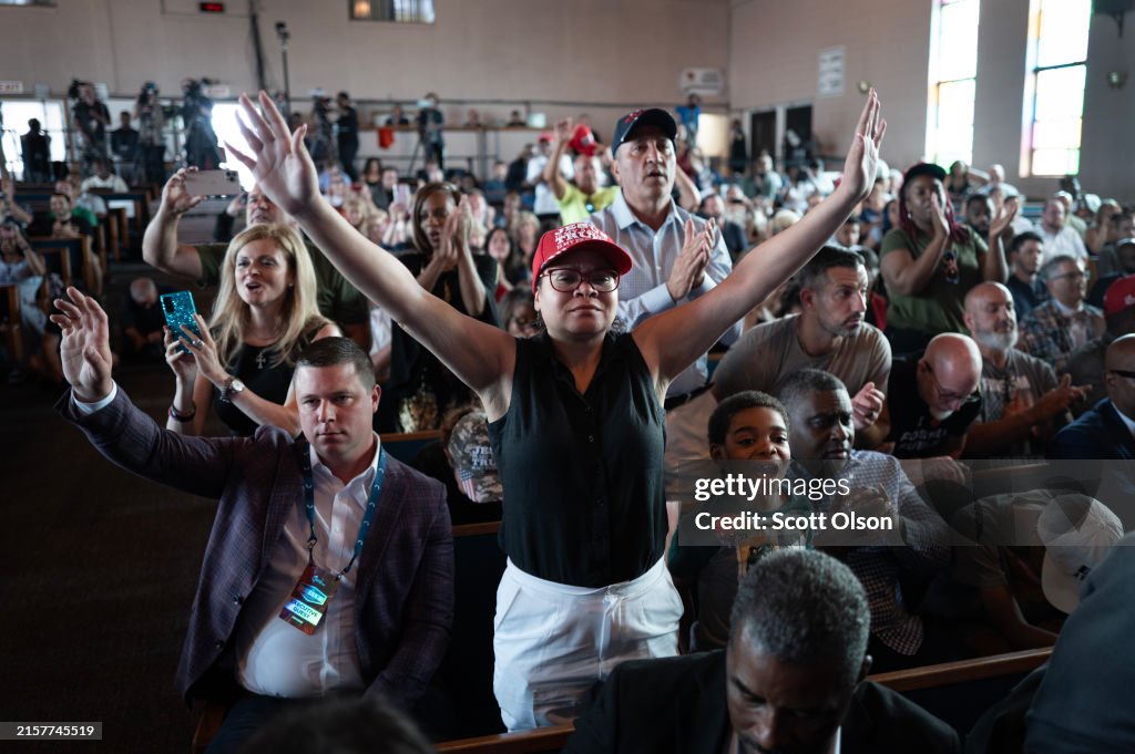Trump Round Table Guests pray at the close of a roundtable discussion with community ...