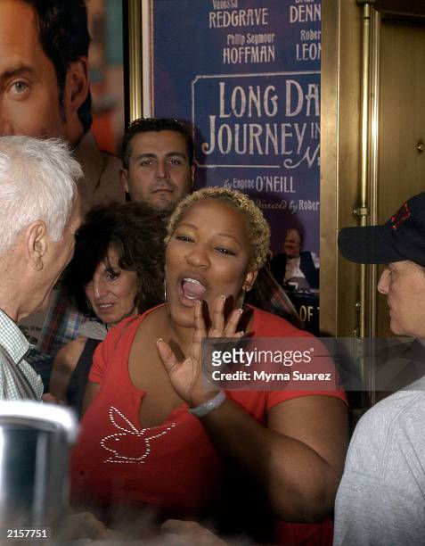 American Idol's Frenchie poses with a puppy at the 5th Annual Broadway Barks July 12, 2003 in Shubert Alley in New York City. Broadway Barks assists...