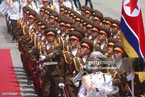 North Korean military officers march during a welcoming ceremony, on June 19 in Pyongyang, North Korea. Russian President Vladimir Putin is in North...