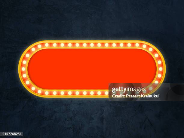 square or oval shaped of the yellow shining marquee on dark concrete - light bulb frame stock pictures, royalty-free photos & images