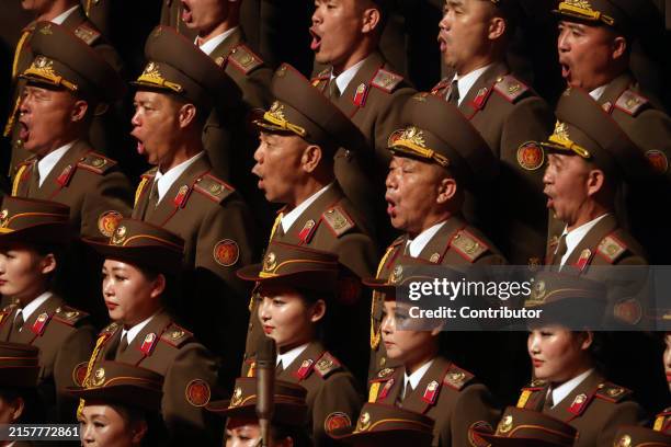 North Korean Military Choir sings a Russian song during a concert after Russian-North Korean talks, June 19 in Pyongyang, North Korea. Russian...