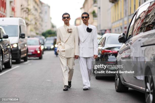 Mohammed Hadban & Humaid Hadban wears patterned sunglasses, Dolce & Gabbana striped cream double breasted suit with a matching flower, Dolce &...