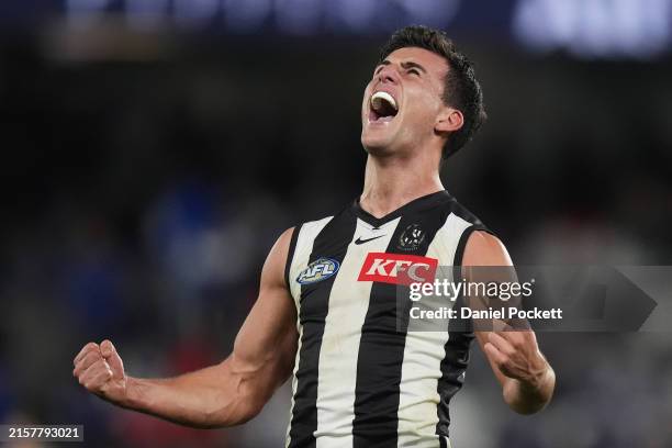 Nick Daicos of the Magpies reacts on the final siren after winning the round 14 AFL match between North Melbourne Kangaroos and Collingwood Magpies...