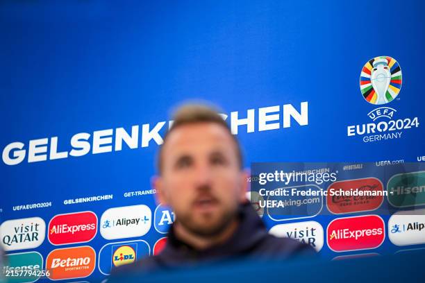 Harry Kane of England in front of the Euro2024 branded press conference sponsors wall at Arena AufSchalke on June 15, 2024 in Gelsenkirchen, Germany.