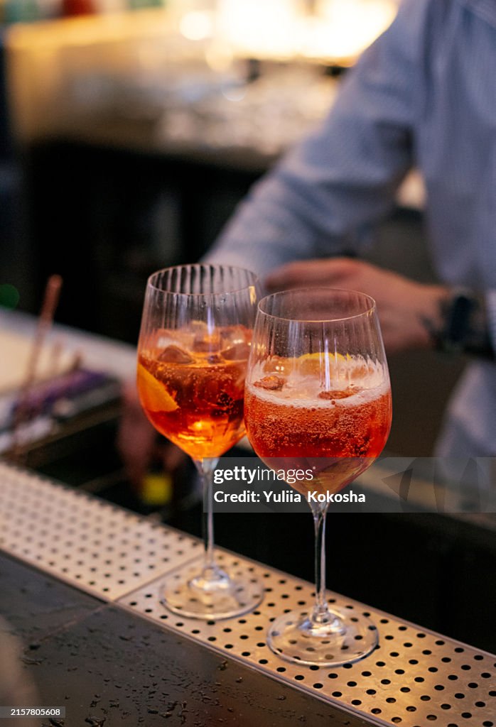 Bartender preparing a spritz aperol