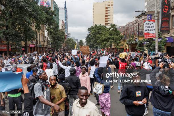 Protesting youth gather along Moi avenue with chants and pickets during demonstrations against tax hikes, as Members of the Parliament continue to...