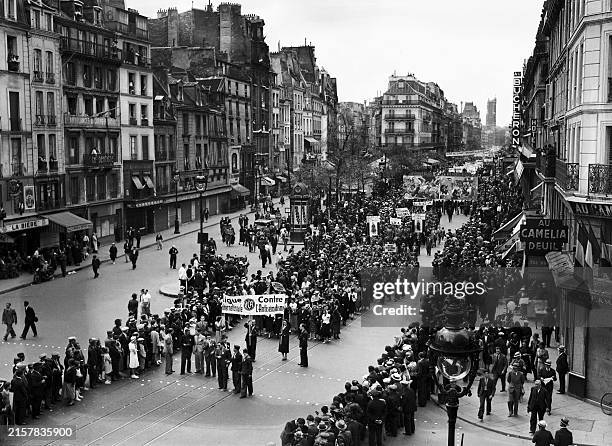 Members of the LICA, International League Against Anti-Semitism, pass through rue de Rivoli in Paris during the great popular parade of July 14, 1936...