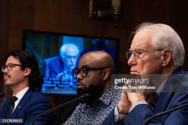 William E. Kirwan, right, vice-chair of Maryland's Accountability and Implementation Board, Gemayel Keyes, center, teacher at Gilbert Spruance...