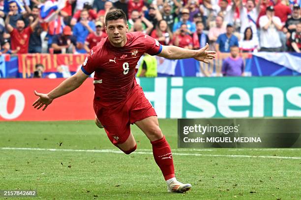 Serbia's forward Luka Jovic celebrates after scoring his team's first goal during the UEFA Euro 2024 Group C football match between Slovenia and...