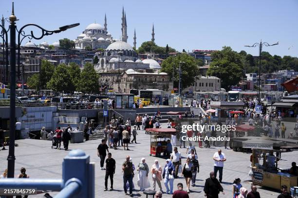 Visitors tour around Hagia Sophia Grand Mosque and Sultanahmet Mosque at Eminonu district in Istanbul, Turkiye on June 20, 2024.