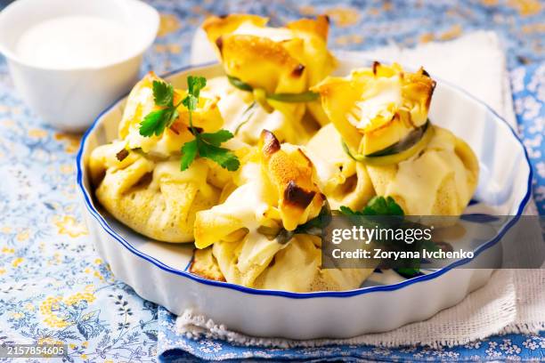 baked pancakes with mushroom - beggars purse stock pictures, royalty-free photos & images