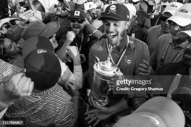 Bryson DeChambeau of the United States celebrates with fans after winning the 124th U.S. Open at Pinehurst Resort on June 16, 2024 in Pinehurst,...