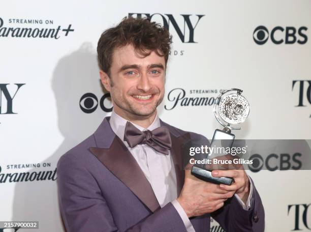 Daniel Radcliffe, winner of the Best Performance by a Featured Actor in a Musical award for “Merrily We Roll Along,” poses in the 77th Annual Tony...