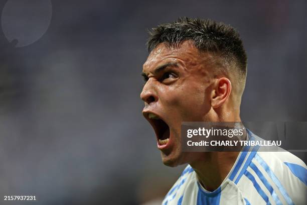 Argentina's forward Lautaro Martinez celebrates scoring his team's second goal during the Conmebol 2024 Copa America tournament group A football...