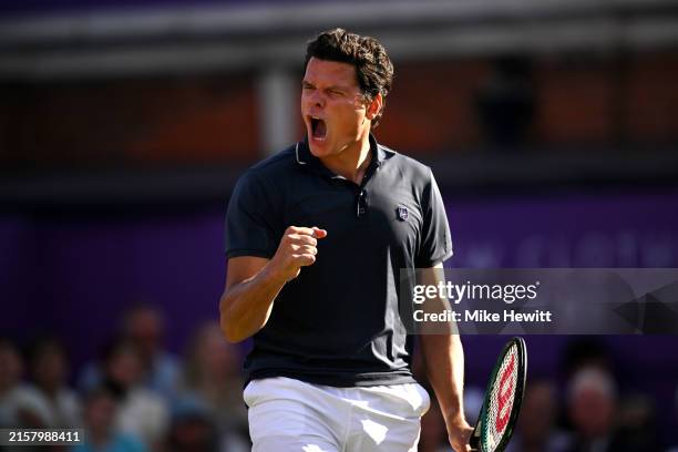 Milos Raonic of Canada celebrates winning match point against Cameron Norrie of Great Britain in the Men's Singles Round of 32 match on Day One of...