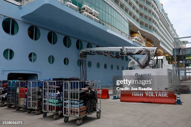 The Royal Caribbean Freedom of the Seas cruise ship is plugged into a newly installed shore power system at PortMiami on June 17, 2024 in Miami,...
