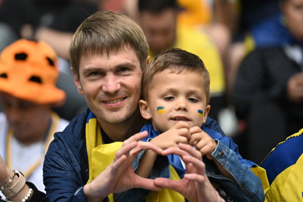 Fans show their support during the EURO 2024 Group E football match between Slovakia and Ukraine at Dusseldorf Arena in Dusseldorf, Germany on June...