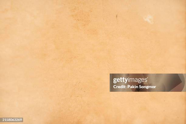 old brown paper texture as background. - pergamena materiale tessile foto e immagini stock