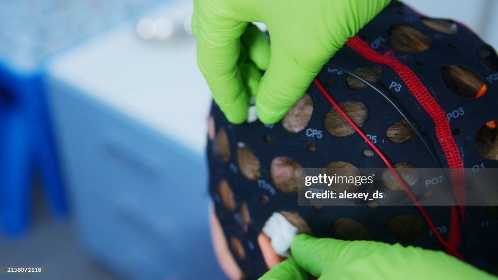 Electrodes attaching to the weared EEG cap