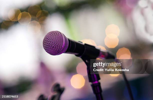 microphone on the stage in nightclub - concert stock pictures, royalty-free photos & images