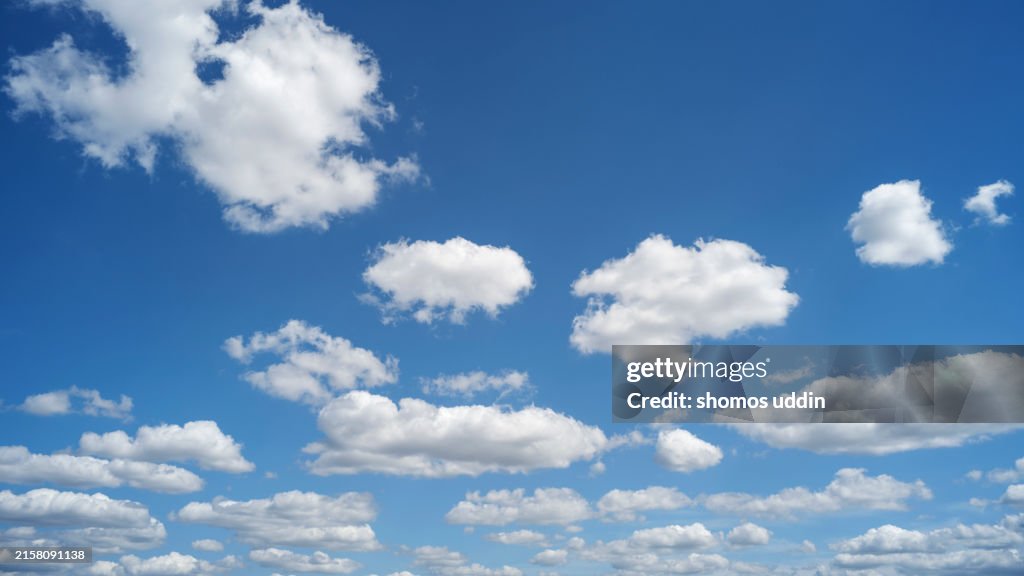 White fluffy clouds sky