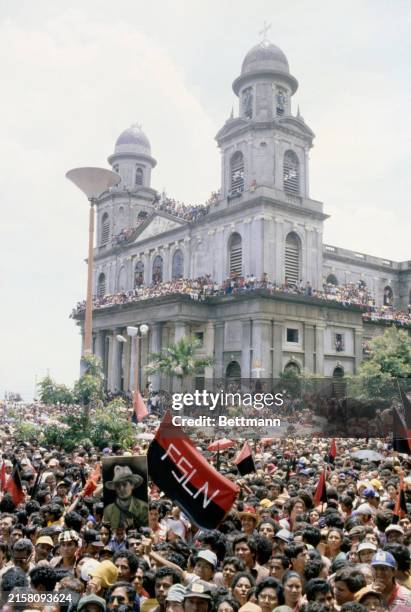 Thousands of Nicaraguans fill the Plaza de la República square in Managua to listen to speeches by members of the provisional junta government,...
