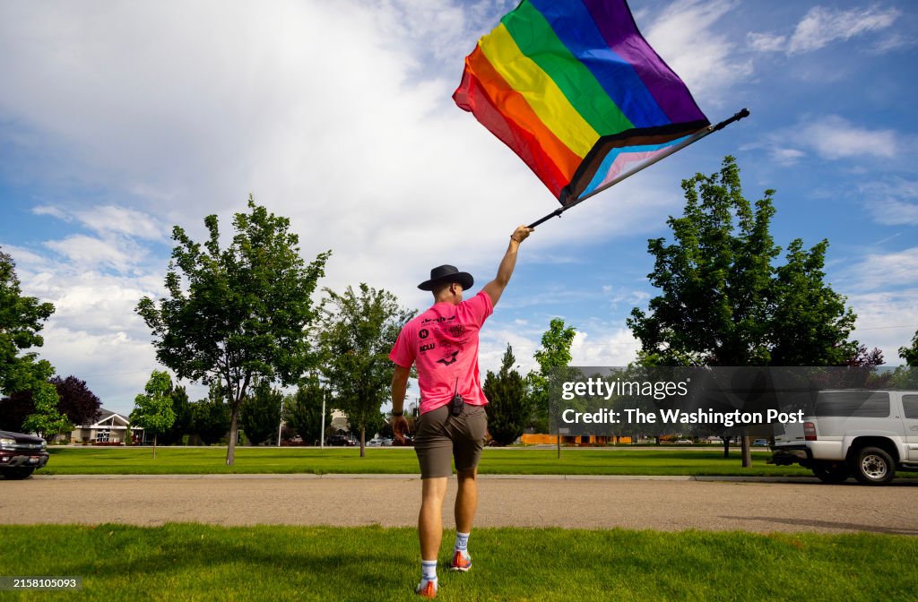 NAMPA, IDAHO - Sunday, June 9, 2024 : Tom Wheeler waves a Pride