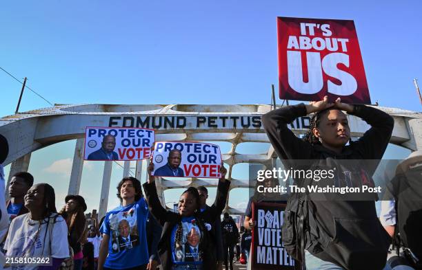 Promoting voting rights, marchers traverse the famed Edmund Pettus Bridge as part of the annual Voting Rights Solidarity March in Selma, Alabama on...