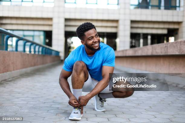 ready for jogging - tying up stock pictures, royalty-free photos & images