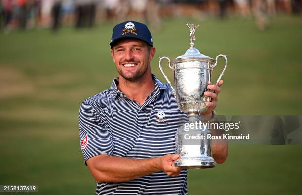 Bryson DeChambeau of the United States poses with the trophy after winning the 124th U.S. Open at Pinehurst Resort on June 16, 2024 in Pinehurst,...