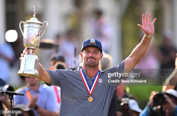 Bryson DeChambeau of the United States poses with the trophy after winning the 124th U.S. Open at Pinehurst Resort on June 16, 2024 in Pinehurst,...