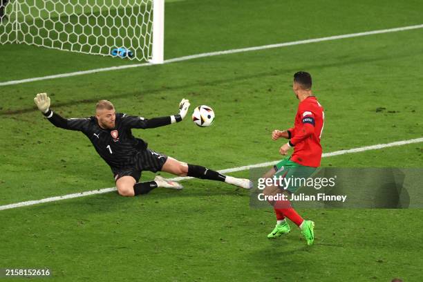 Jindrich Stanek of Czechia saves a shot from Cristiano Ronaldo of Portugal during the UEFA EURO 2024 group stage match between Portugal and Czechia...