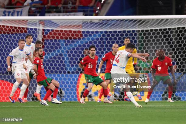 Lukas Provod of Czechia scores his team's first goal during the UEFA EURO 2024 group stage match between Portugal and Czechia at Football Stadium...