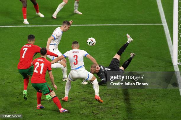 Robin Hranac of Czechia concedes an own goal, the first goal for Portugal, as Jindrich Stanek of Czechia looks on during the UEFA EURO 2024 group...