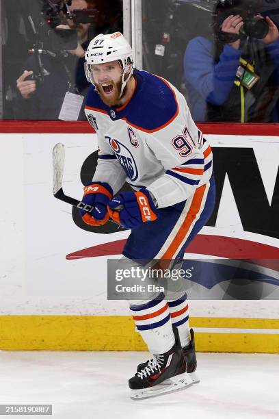 Connor McDavid of the Edmonton Oilers reacts after scoring an empty net goal during the third period against the Florida Panthers in Game Five of the...