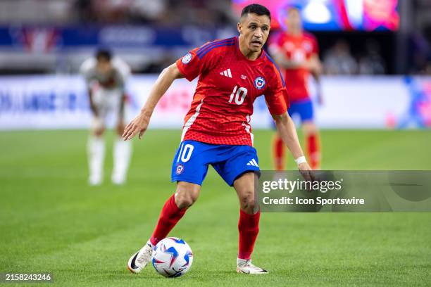 Chile forward Alexis Sanchez dribbles up field during the CONMEBOL Copa America match between Peru and Chile on June 21, 2024 at AT&T Stadium in...