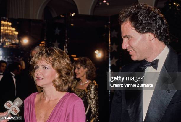 Actress Sally Field with her husband, producer Alan Greisman at the AFI Lifetime Achievement Awards, Los Angeles, California, March 6th 1986. The...